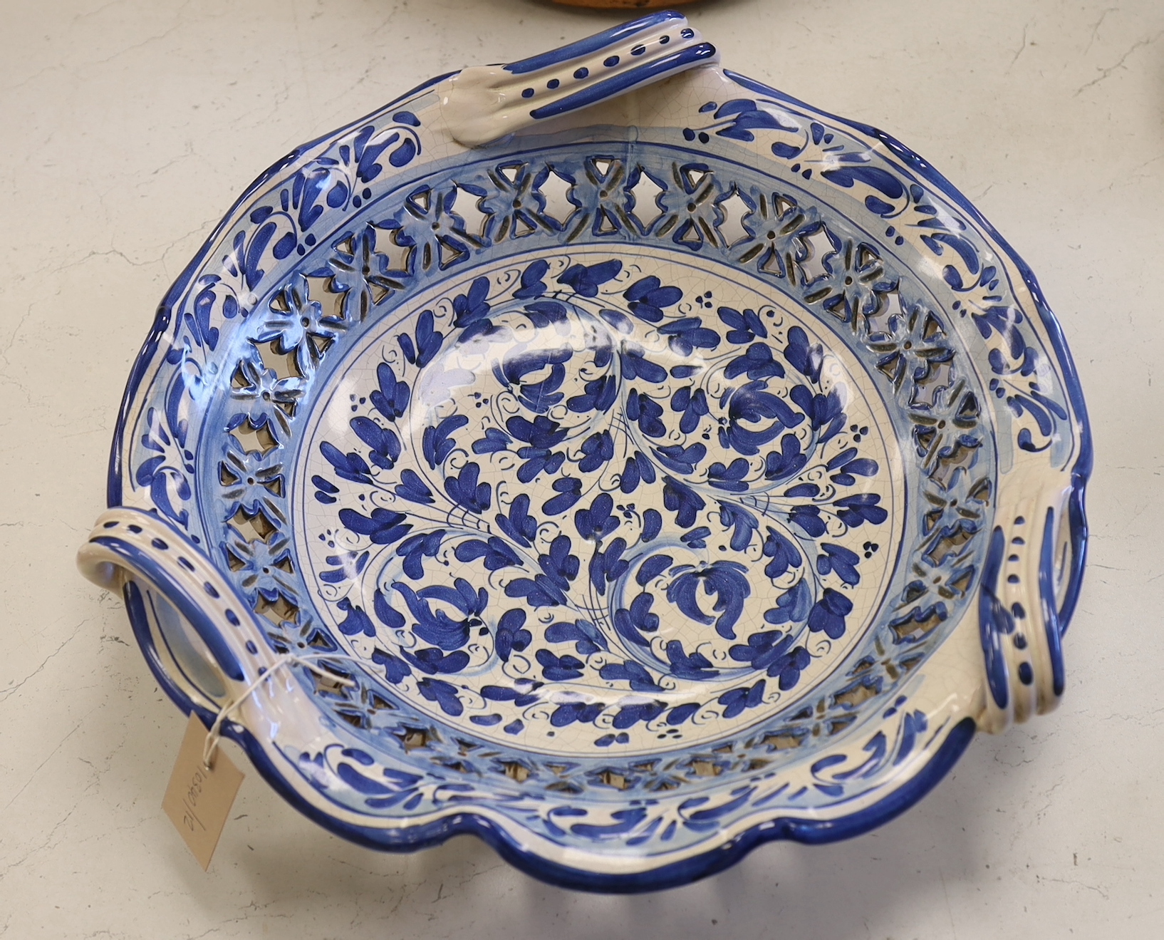 Ernesto Boria, large Italian Caltagirone ceramic blue and white charger, decorated with stylised flowers, signed to the base, 40cm diameter